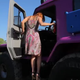 Illustration for article titled This Russian Lady Rolls In A Pink All Terrain Vehicle